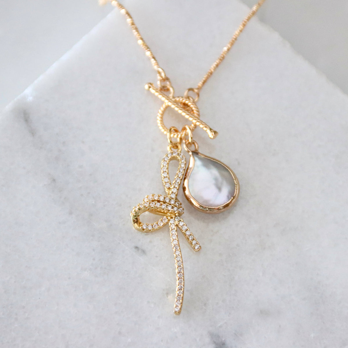 CZ Bow Pearl Coin Necklace