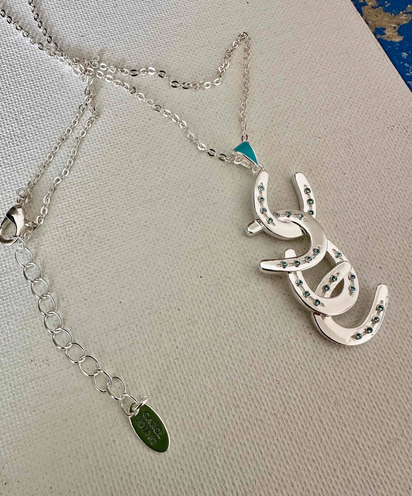 Four horseshoe necklace