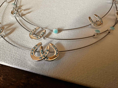 Multi mini horseshoes w/aqua bead necklace