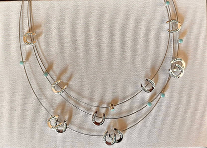 Multi mini horseshoes w/aqua bead necklace