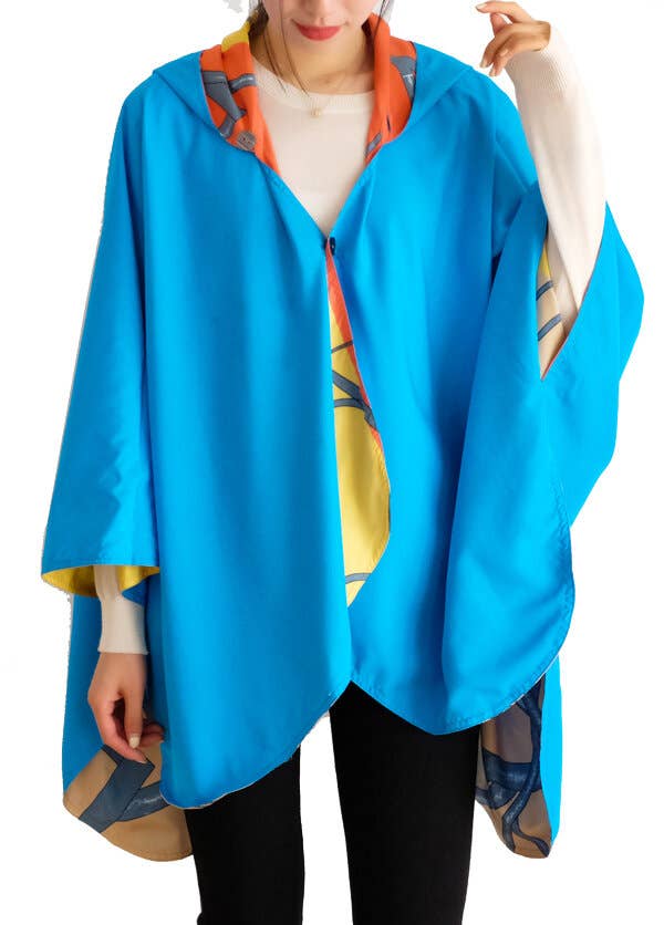 Equestrian Turq/Orange Reversible Rain Cape - Swirling Horse