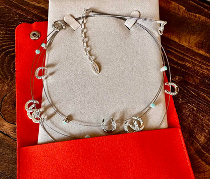 Multi mini horseshoes w/aqua bead necklace